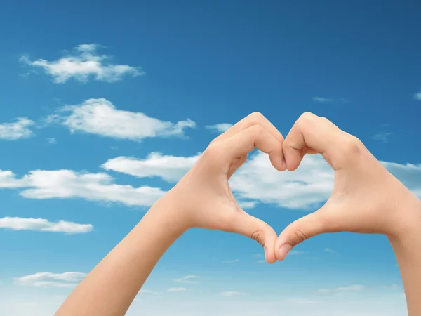 Heart over blue sky background — Stock Photo, Image