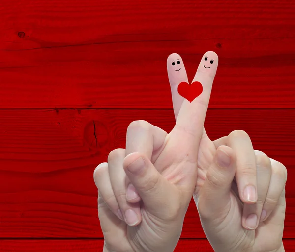 Two hand fingers with a heart painted — Stock Photo, Image