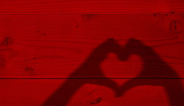 Valentine ludzkie ręce sylwetka symbol serca lub miłości — Zdjęcie stockowe
