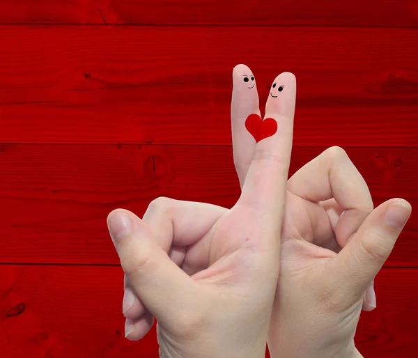 Due dita della mano con un cuore dipinto — Foto Stock