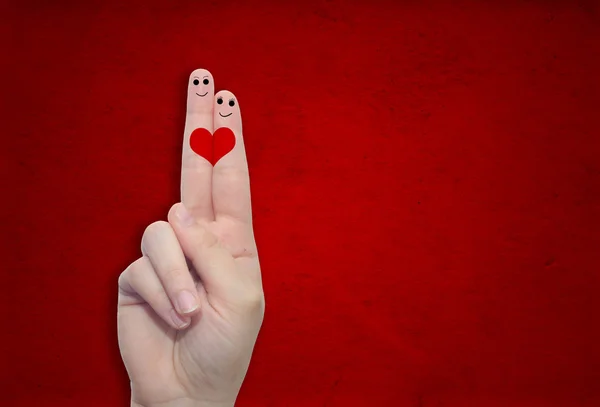 El parmakları ile ve bir kalp boyalı — Stok fotoğraf