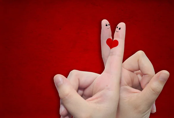 Due mani con le dita e un cuore dipinto — Foto Stock