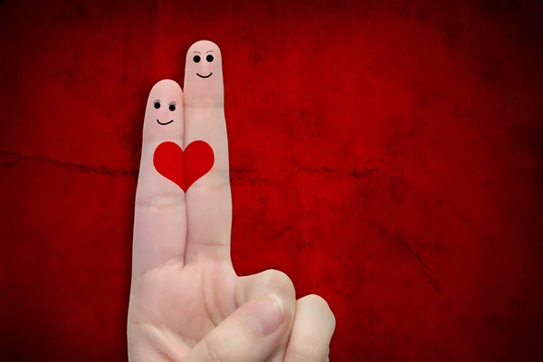 Fingers and a heart painted Royalty Free Stock Images