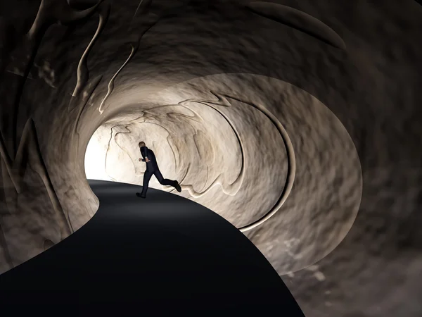 Koncept eller konceptuell 3d business man, mörk vägtunnel med starkt ljus på slutet bakgrunden — Stockfoto