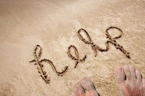 Konzept oder konzeptioneller Hilfetext handgeschrieben in Sand — Stockfoto