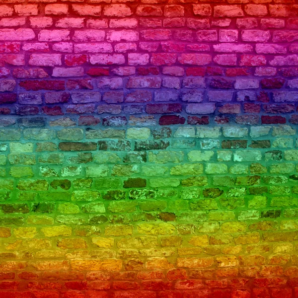 Concept or conceptual colorful painted or graffiti old vintage grungy brick wall texture or urban background — Stock Photo, Image