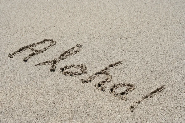 Aloha text handskriven på sand — Stockfoto