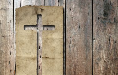 Vintage eski eski kağıt afiş din ya da inanç tasarımlar için eski ahşap arka plan üzerinde bir Hıristiyan dini haç ile