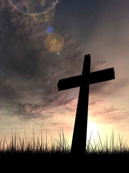 Koncepcja pojęciowy czarny krzyż lub religia symbol sylwetka w trawie na zachód lub wschód słońca niebo w tle chmury światło słoneczne — Zdjęcie stockowe