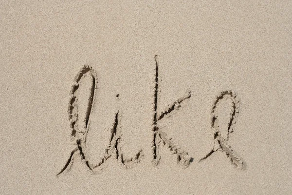 Liketext handwrittenon άμμο — Φωτογραφία Αρχείου