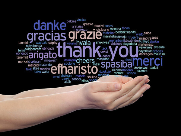 Концепция или концептуальные абстрактные спасибо слово облако держал в руках на разных языках или многоязычный для образования или День благодарения

