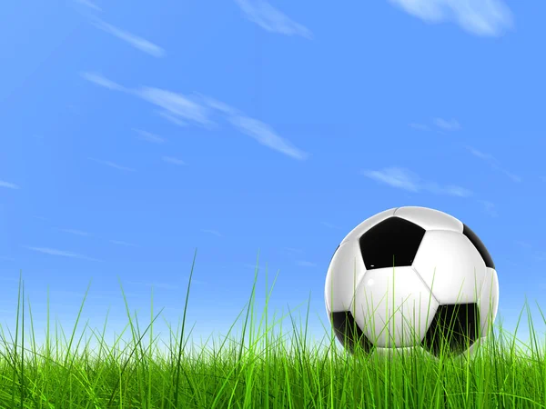 Concept of conceptuele 3d voetbal in verse groene zomer of voorjaar veld gras met een blauwe hemelachtergrond — Stockfoto