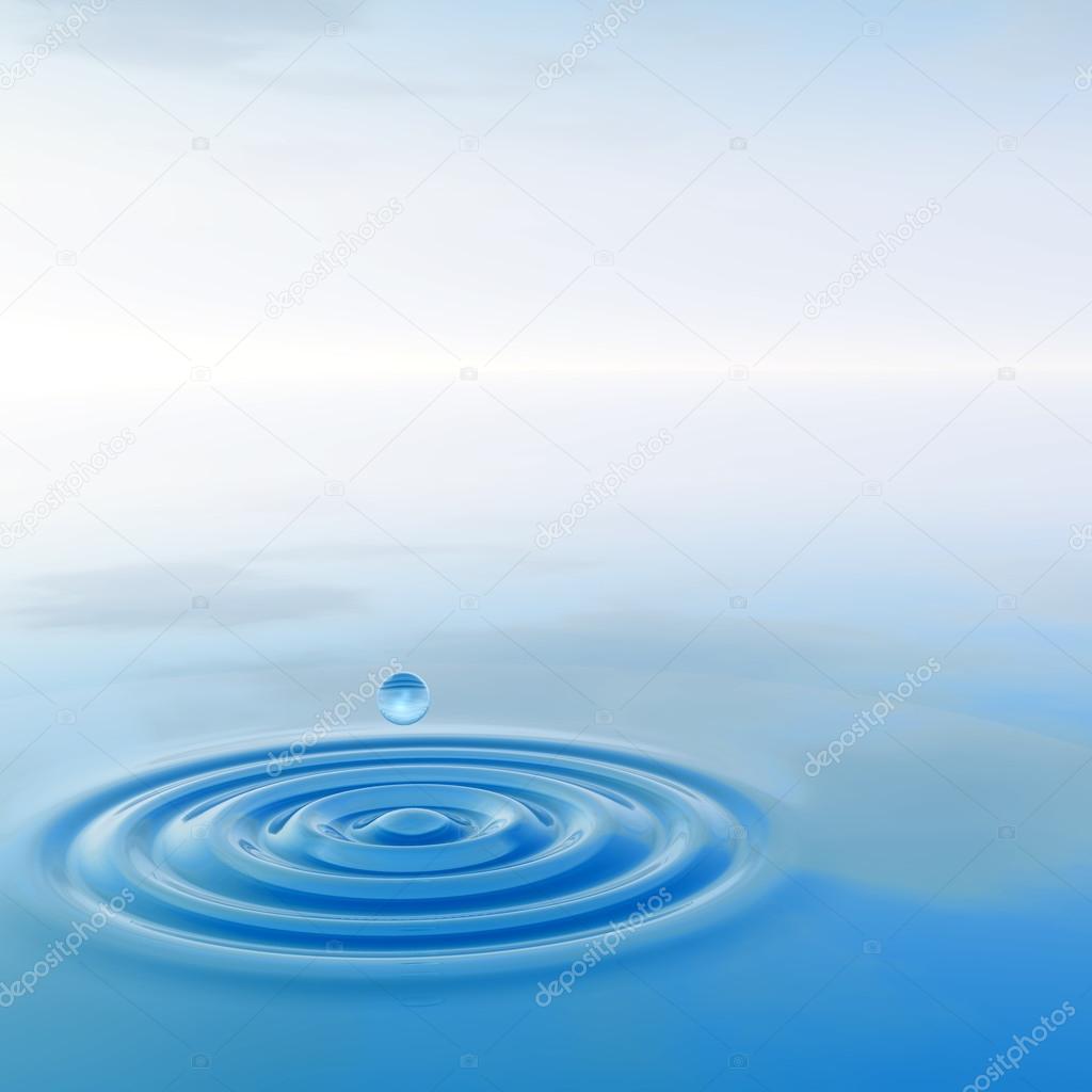 blue liquid drop falling