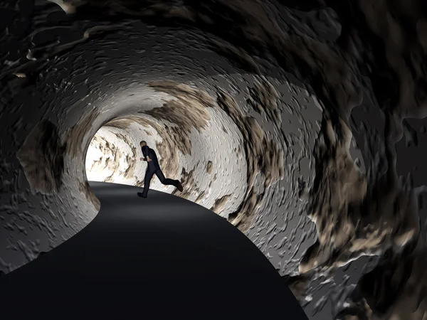 Hombre de negocios en túnel camino oscuro —  Fotos de Stock