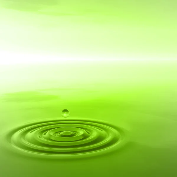 Gota de líquido verde cayendo —  Fotos de Stock