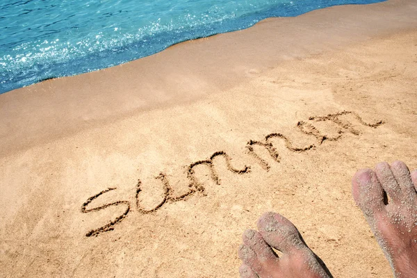 Text handgeschrieben auf Sand — Stockfoto