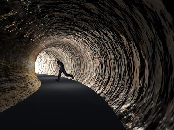Affärsman på mörka vägtunnel — Stockfoto