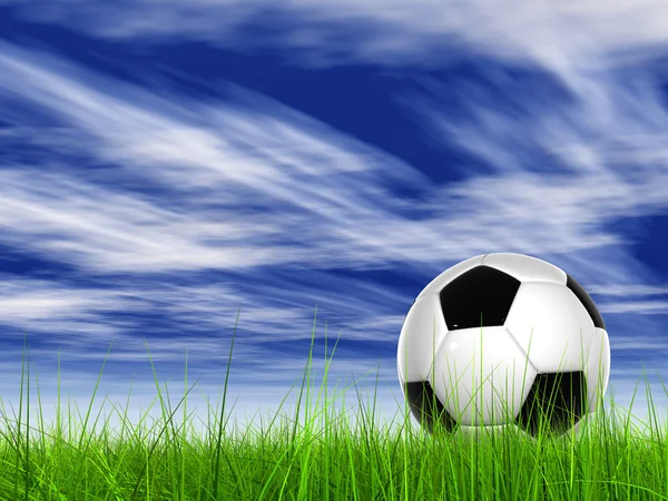 Ballon de football dans l'herbe du terrain — Photo
