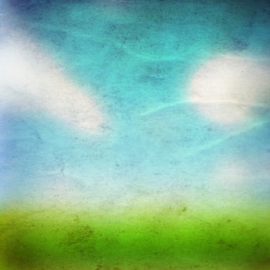 pring grass field over a blue sky