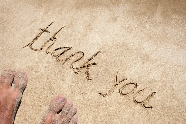 Thank you written on sand — Stock Photo, Image