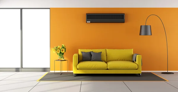 Oranje woonkamer met air conditioner — Stockfoto