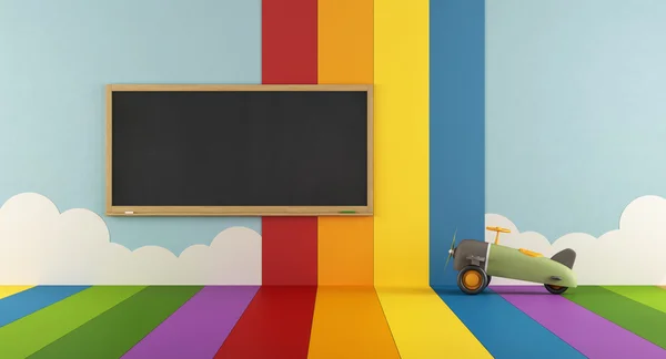 Kolorowy pokój zabaw z tablica — Zdjęcie stockowe
