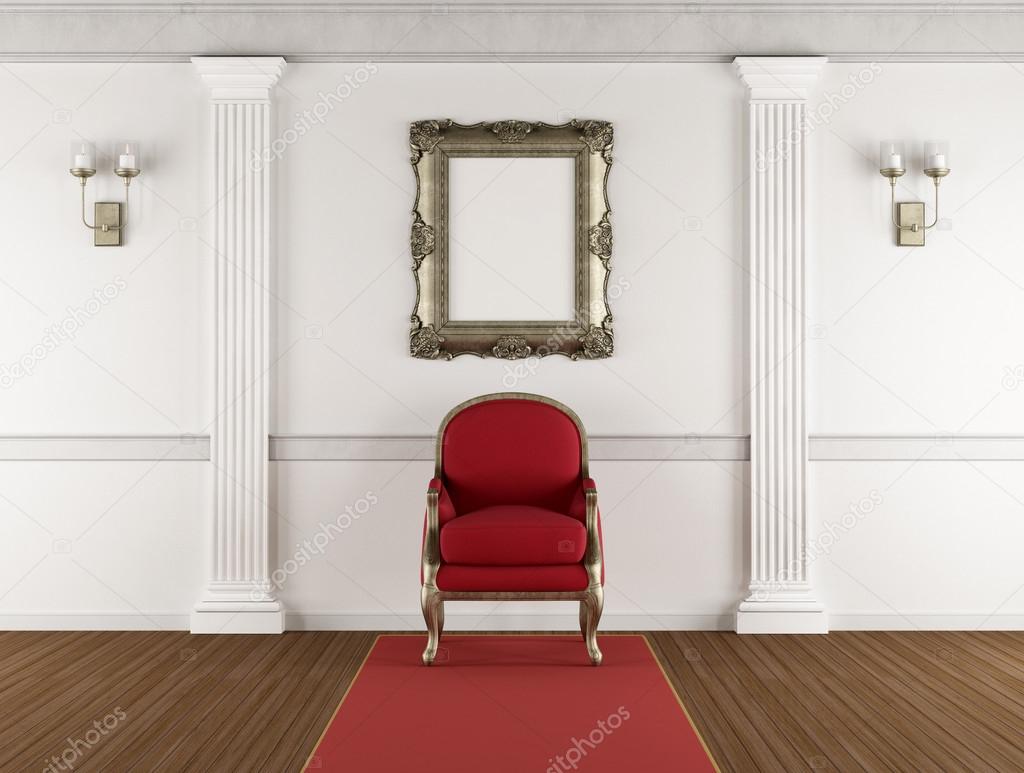 White classic interior with red armchair