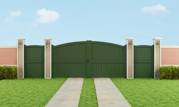 Trädgård med stor uppfart gate — Stockfoto