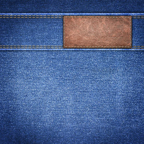 Fondo denim simple con etiqueta de cuero de cerca — Foto de Stock