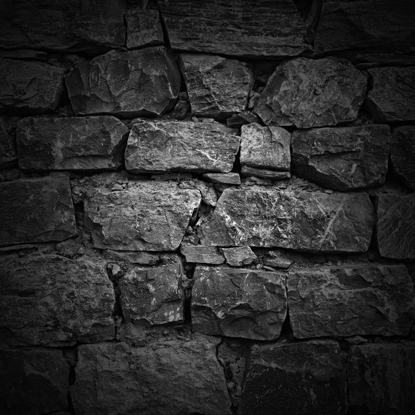 Wall of rough stones. light effect — Stock Photo, Image