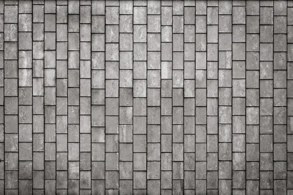 Enfrentando azulejos cinza como um fundo vintage — Fotografia de Stock