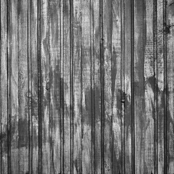 Old cracked blackened planks as a backdrop for design — Stock Photo, Image