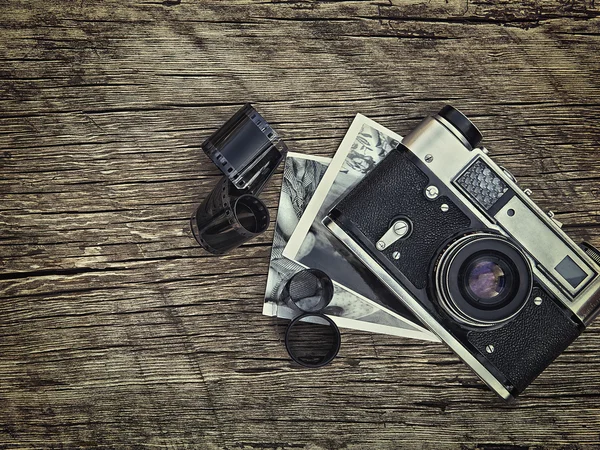 Old vintage camera closeup on wooden background — Stock Photo, Image