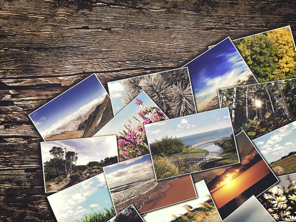 старые винтажные фотографии на деревянном фоне
