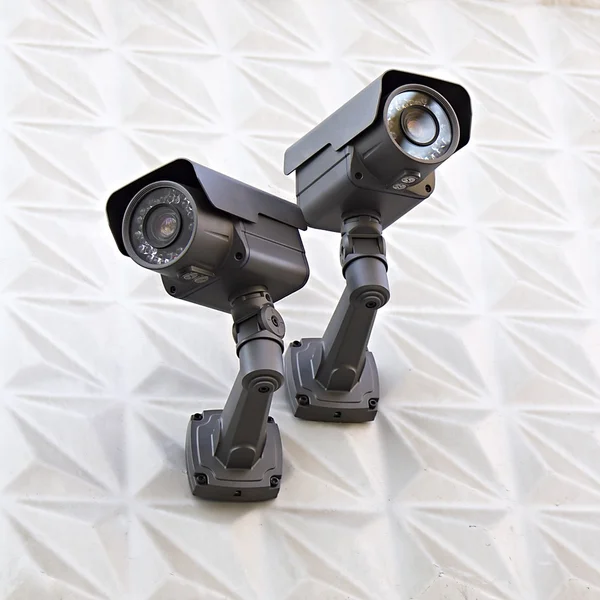 Videoövervakning kamera på en vägg av byggnaden — Stockfoto
