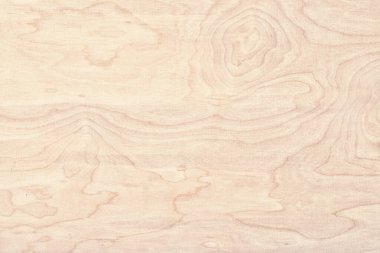 Doğal desenli bir ışık panosu. arkaplan olarak bej ahşap dokusu