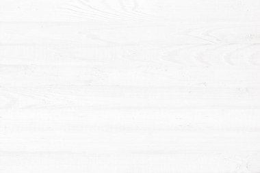 Arka plan olarak hafif tahta masa. beyaz ahşap desen duvar paneli 