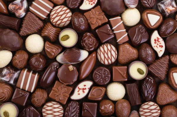 Čokoládové Bonbóny Pozadí Sladké Jídlo Různými Náplněmi — Stock fotografie