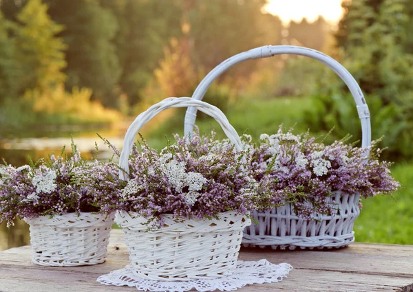 Bouquets of flowers in baskets