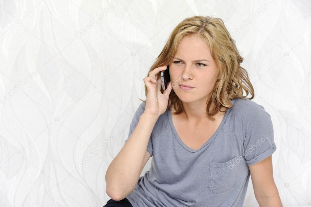 Young woman talking on the phone