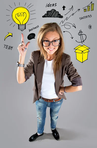 Business woman pointing showing and looking to the side up at em — Stock Photo, Image