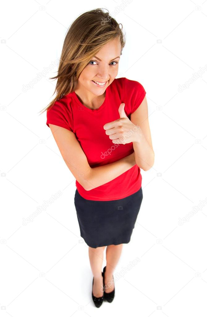 Business woman pointing showing and looking to the side up at empty copyspace.