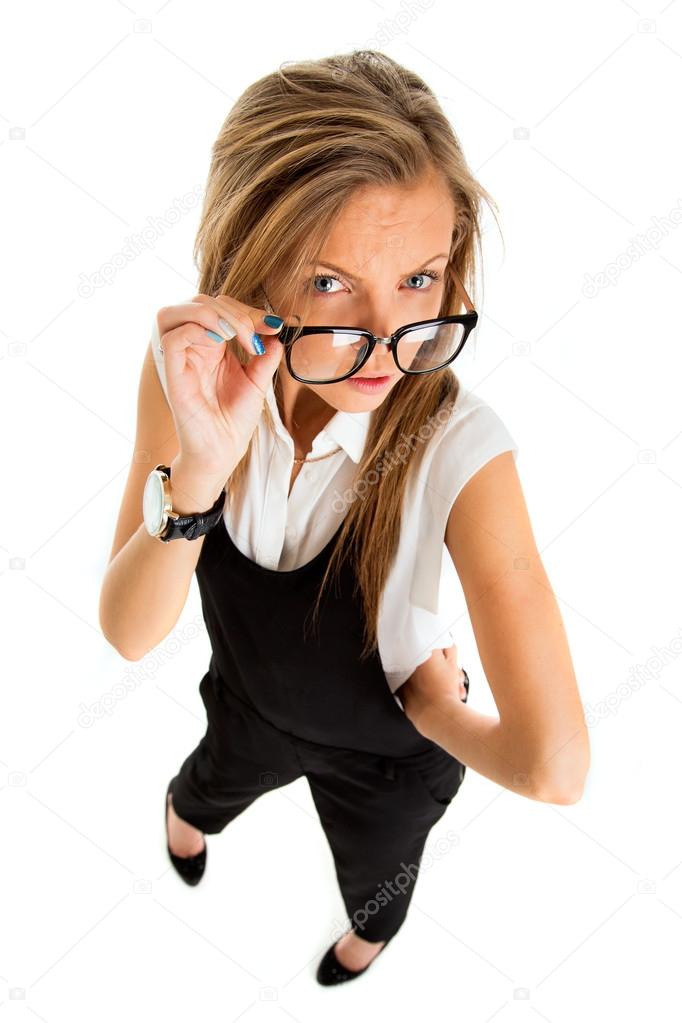 Suspicious upset angry and funny secretary taking off her glasse