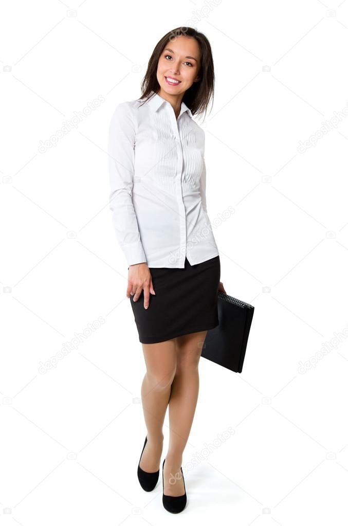 Businesswoman walking in full length on white background. Young