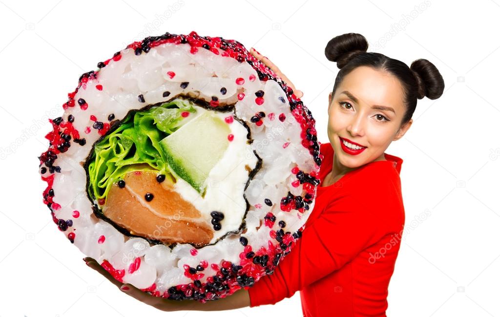 Young beautiful woman holding sushi, isolated on white