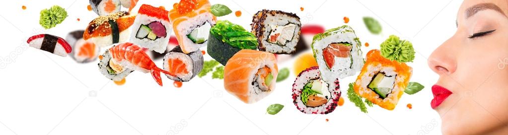 Delicious pieces of sushi, isolated on white background