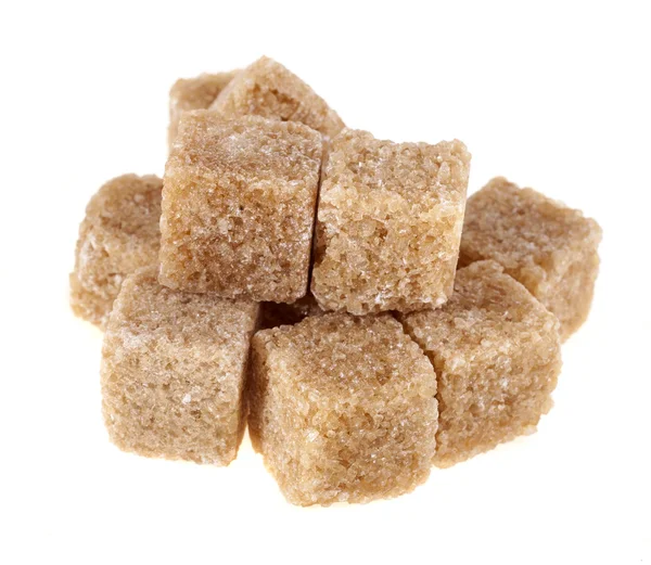 Cubes of brown sugar, isolated on white — Stock Photo, Image