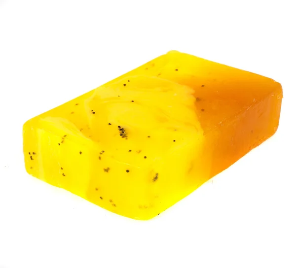 Jabón natural de color amarillo sobre fondo blanco —  Fotos de Stock