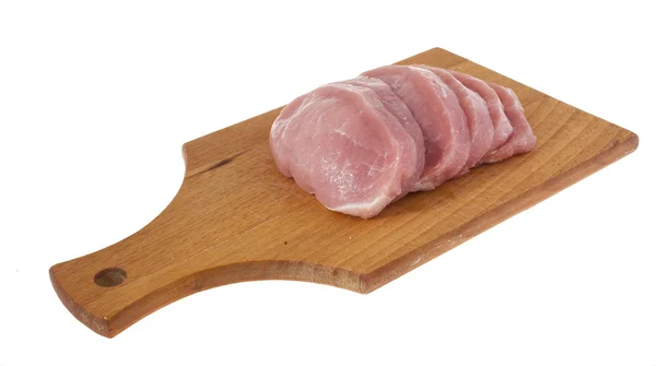 Syrové maso na řezací desce — Stock fotografie