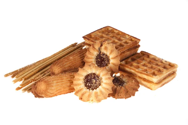 Diferentes variedades de galletas aisladas sobre fondo blanco — Foto de Stock